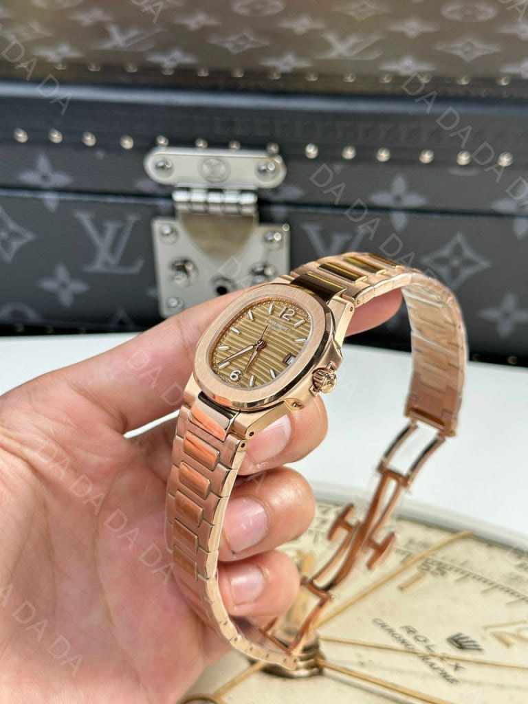 파텍필립 노틸러스 7010 로즈골드 금통 골드다이얼 32mm 5