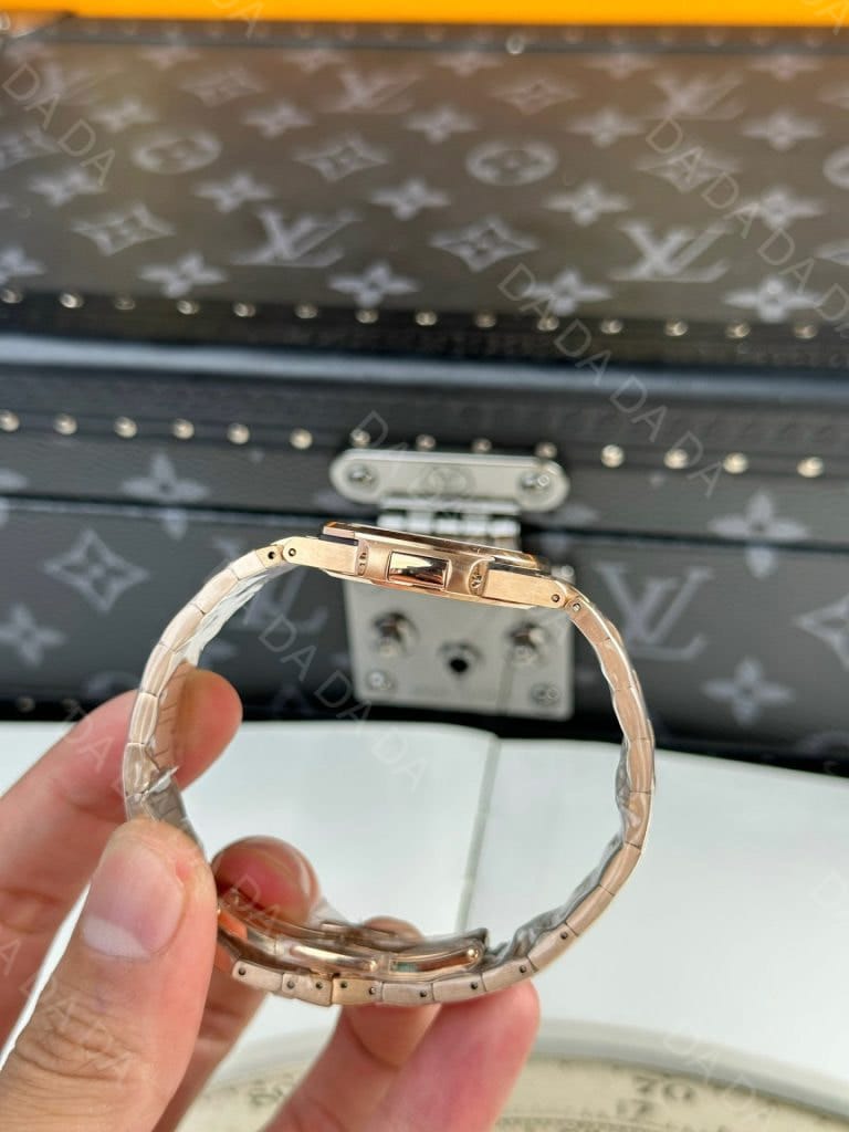 파텍필립 노틸러스 7010 로즈골드 금통 골드다이얼 32mm 7