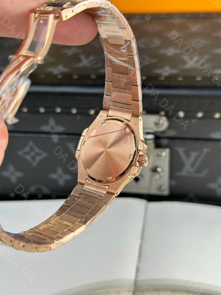 파텍필립 노틸러스 7010 로즈골드 금통 골드다이얼 32mm 9