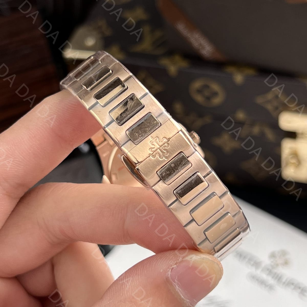 파텍필립 노틸러스 7010 로즈골드 금통 화이트다이얼 다이아베젤 32mm 9